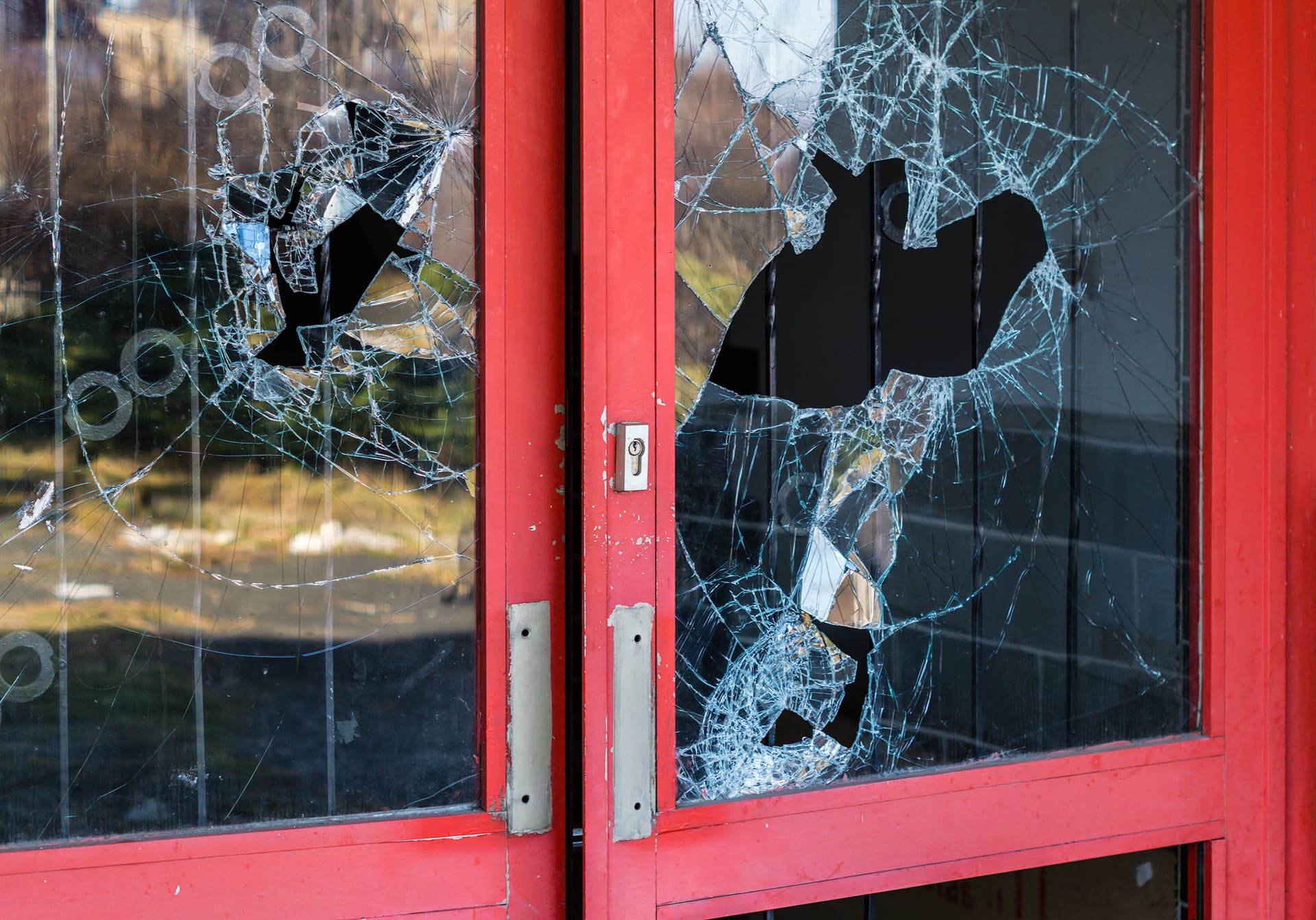 Broken commercial glass doors needing emergency repair